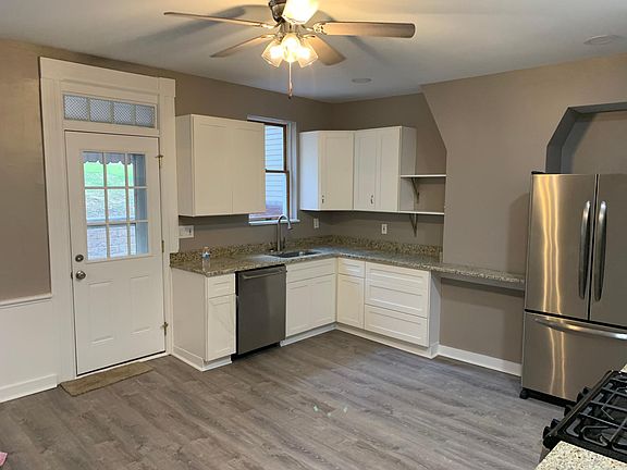 Newly renovated eat-in-kitchen with granite counters and stainless appliances