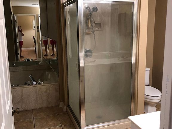 Shower and large jacuzzi tub