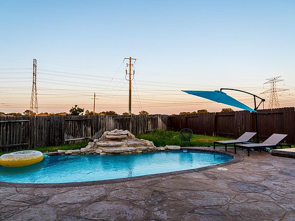 Sunset serenity by the poolside a?? perfect for a relaxing evening!