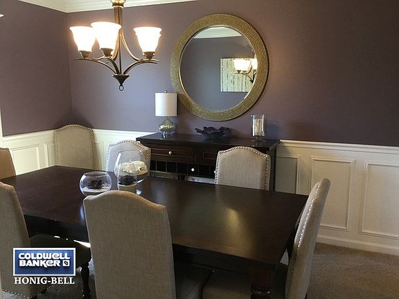 Dining Room includes upgraded lighting and wainscoting.