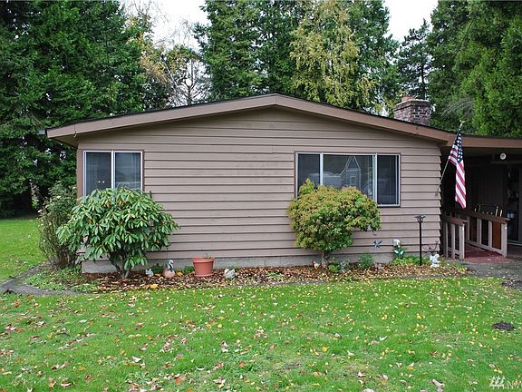 carport parking with storage space. RV Sewer connection just past concrete pad.