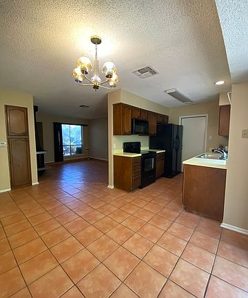 4th image of 9215 Cliff Haven Dr