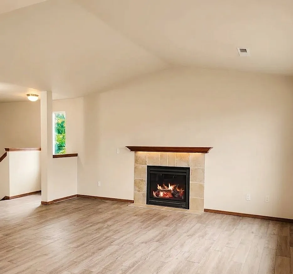 Spacious main living room with fireplace. - 199 Goldmyer Dr