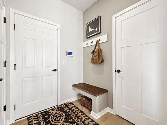Enjoy the functional boot bench as you walk in from the garage.
