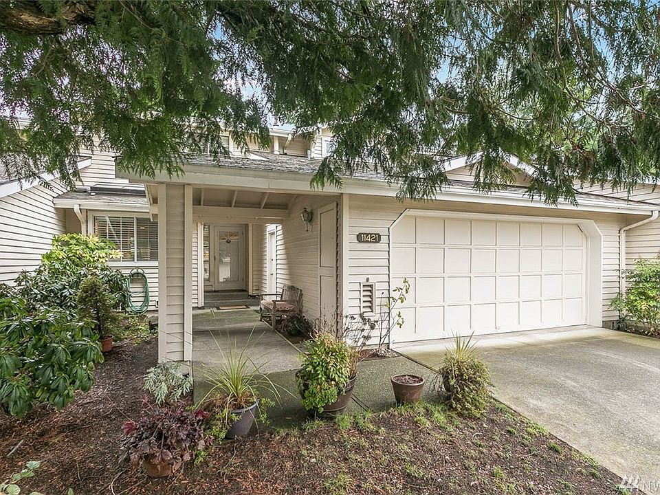 Welcome home to Pembrook Meadows! This fantastic 3 bedroom, 3 bath townhome-style condo will delight you with its soaring ceilings, beautiful millwork, spacious feel, gleaming floors and updated kitchen and bathrooms. The kitchen has been beautifully remodeled with white cabinets, granite counters and stainless steel appliances. The great floorplan provides a master suite on the main floor with gorgeous ensuite bath and a slider to a covered patio. Upstairs find two large bedrooms with double closets, one of which shares continental access to a beautifully remodeled bathroom and could function as a second master. Extend your living space outside to the entertainment sized patio and lovely landscaped garden and private backyard space. This unit has an attached 2-car garage plus room for more cars in the driveway. Enjoy all the benefits of home ownership with fantastic amenities including a pool, clubhouse and tennis court.