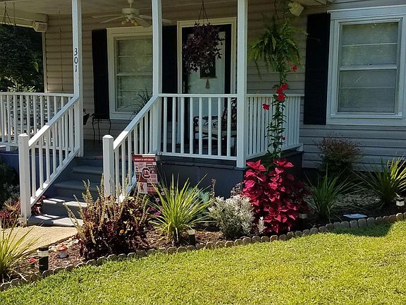 Side view of property with large corner lot with lots of privacy