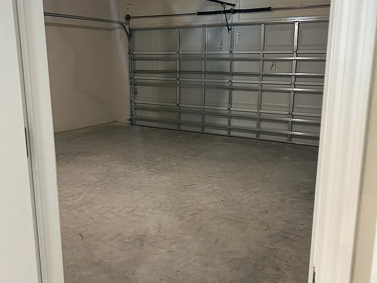 Spacious 2 car garage with automatic opener with smart home technology - use your phone to open/close garage door!