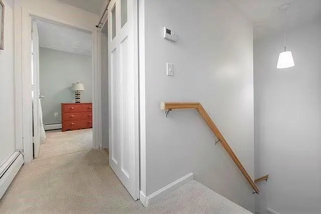 Stairway to 2nd level, hallway and Guest Bedroom