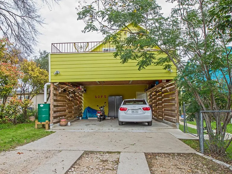 carport parking on right side. Unit entry at carport