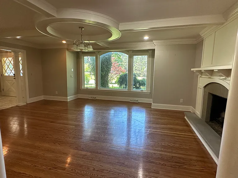 Formal dining room with gas fireplace.