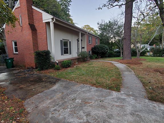 Parking for multiple cars with EV-equipped 220V charger.