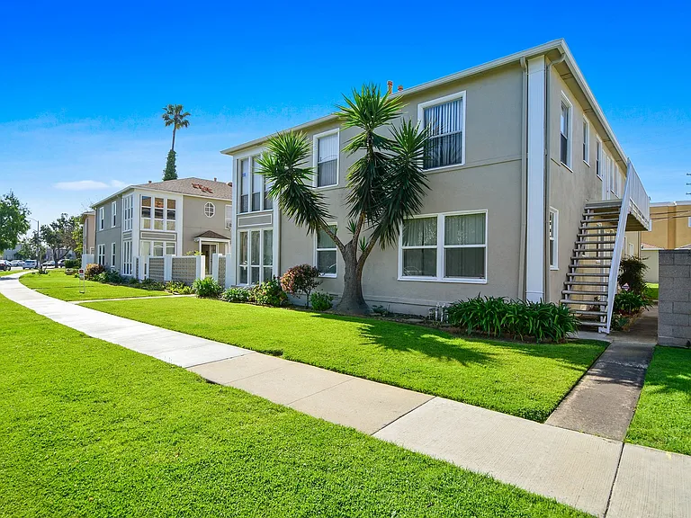 Building Entrance With Palm Tree