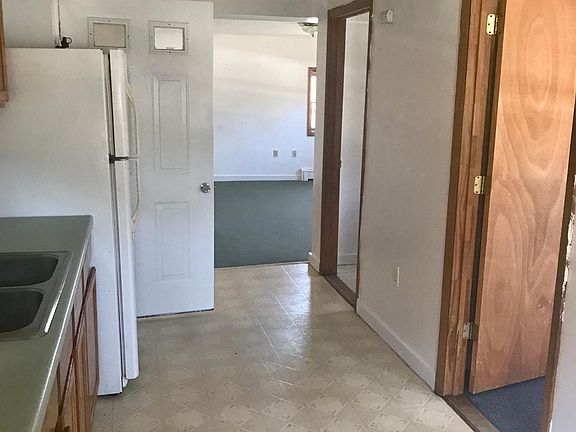 View of living room and bedroom 2 from kitchen 