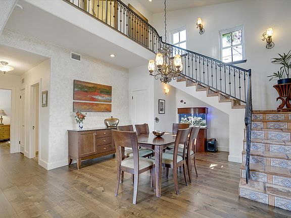 View as you enter the home to dining room and stairs