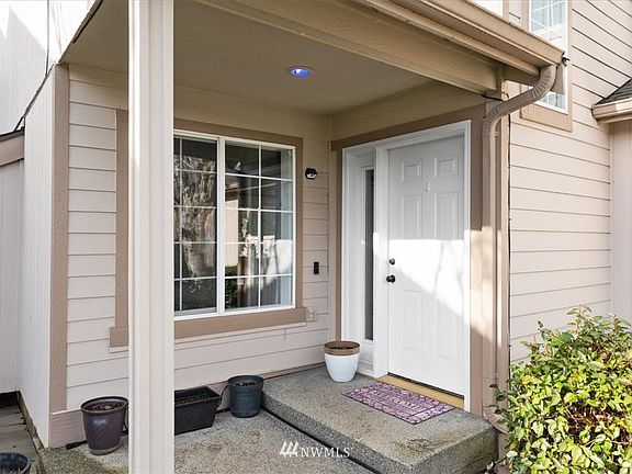 Inviting front door and covered patio.