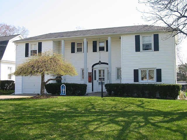 Gracious  Colonial w/ heated Garage!