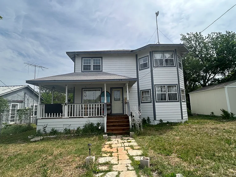 803 N. Hackberry is a 3-bedroom and 2.5 bathroom two story house.