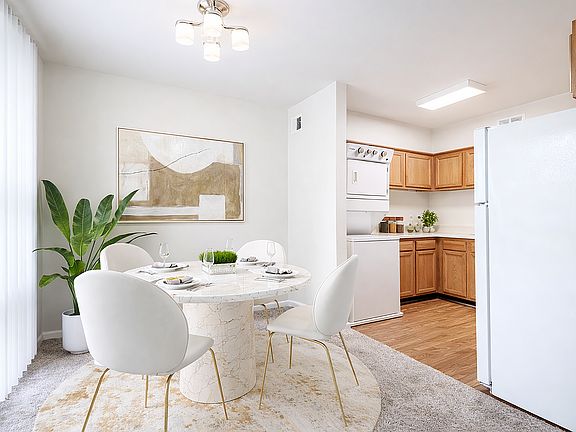 Modern dining space with kitchen view