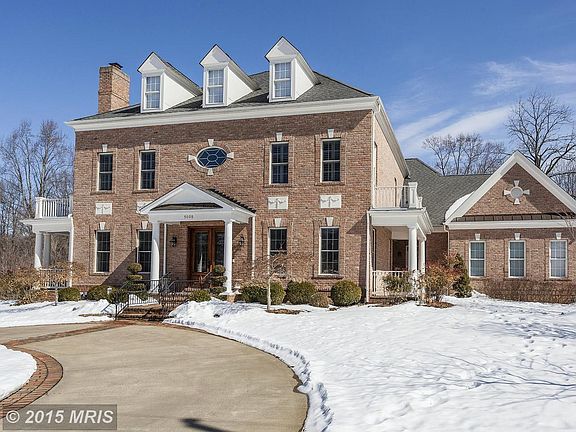 Front of house with circular driveway