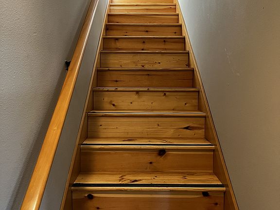 Stairs inside unit to main living