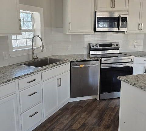 4th image of 6013 Woodland Drive
