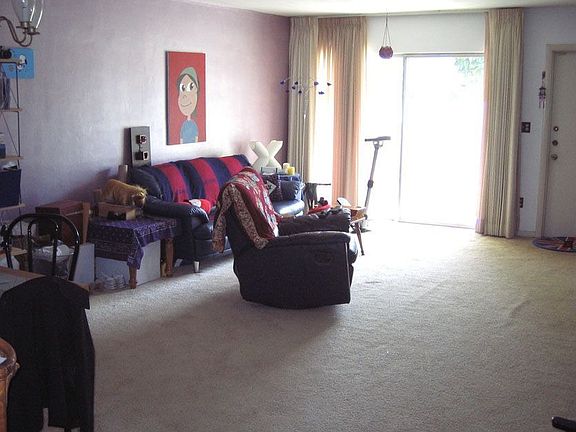 Living Room with Slide Glass Door w/ backyard view