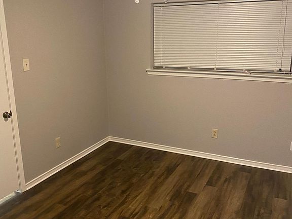 Updated bedroom w/ fresh paint and new flooring