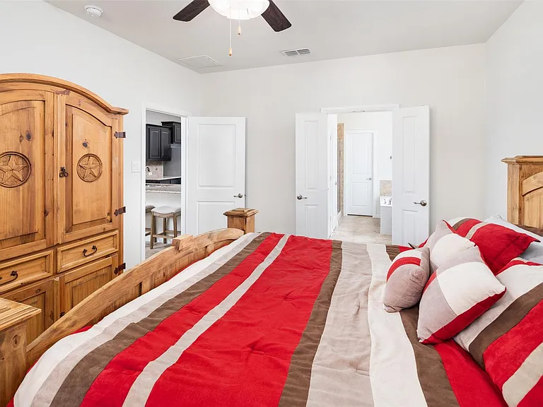 The pictures were taken while the home was occupied. None of the furniture is included with the home.