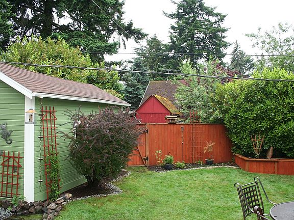 Yard with view of garage