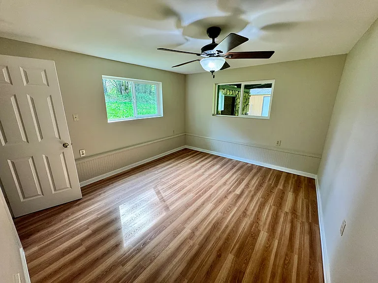 Primary bedroom with Walk-in closet, fresh paint and NEW Vinyl windows!