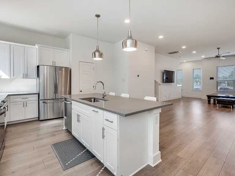 Kitchen, dining, and living room view.