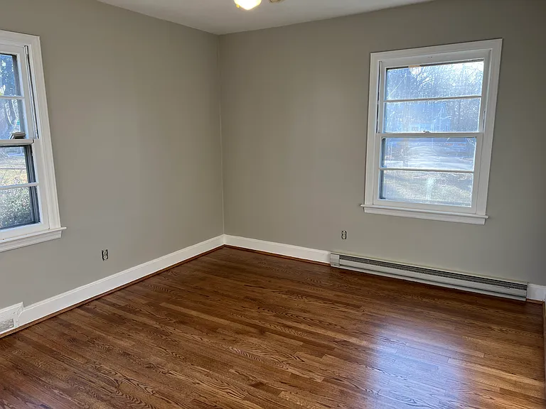 Main bedroom. Freshly painted and floors sanded, stained, and protected with polyethylene.