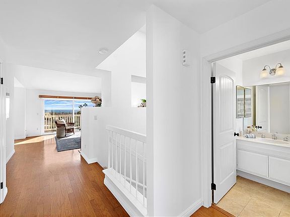 view from entry, half bath on the right