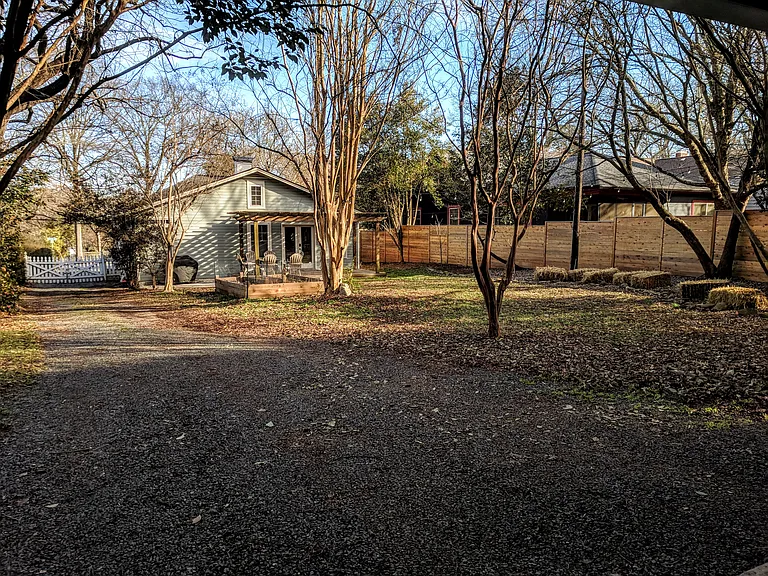 View of yard and house from garage