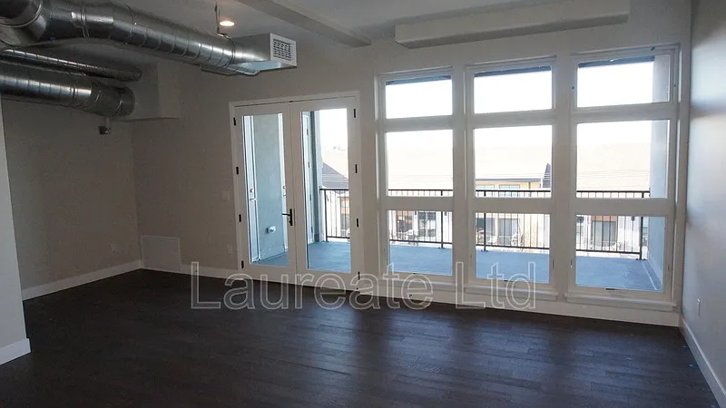 Building Photo - 3198 Blake St #408