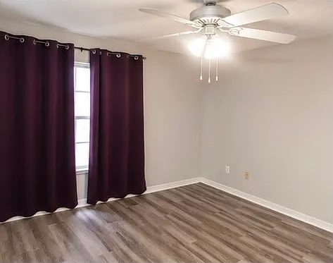 Spacious primary suite with walk-in closet and private bathroom.