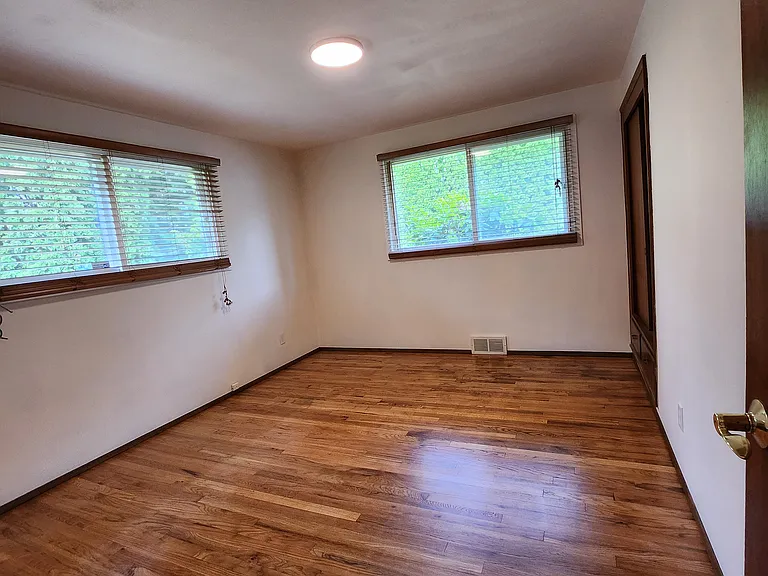 Bedroom 2 is large. Also with 2 built in's and a view of the side and front yard.