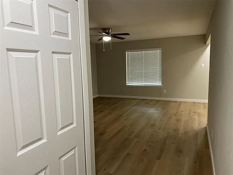 Entry looking into the Living Room. All new flooring throughout property