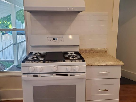 part of kitchen, separate laundry room to the right