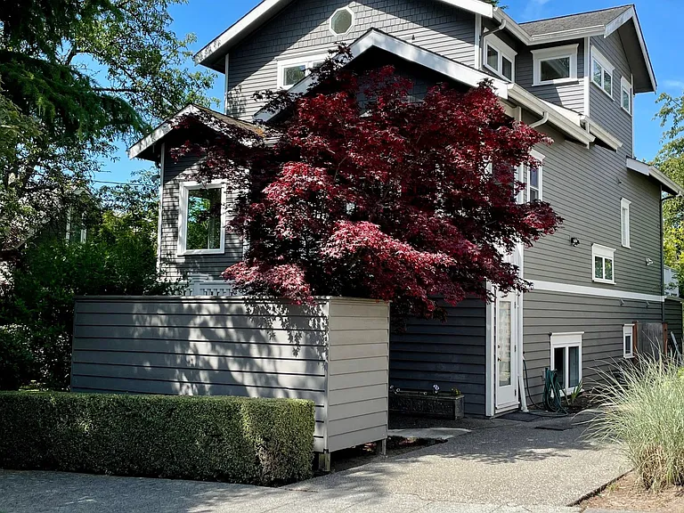 Home is on a quiet Ballard street with ample parking blocks to shops and restaurants, Whittier elementary, Ballard pool and Ballard High