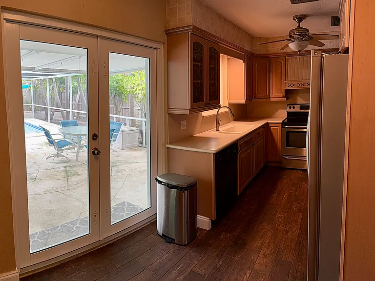 Kitchen and doors to back patio / pool