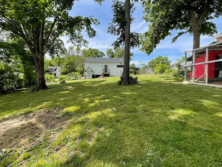 Looking at back of house from far end of the yard.