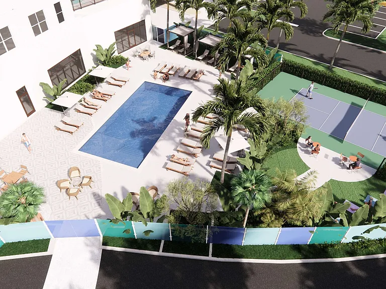 Ariel view of pool and pickleball court