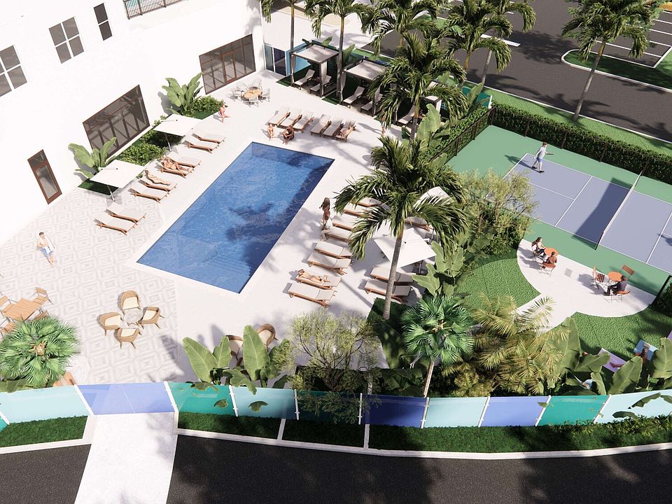 Ariel view of pool and pickleball court
