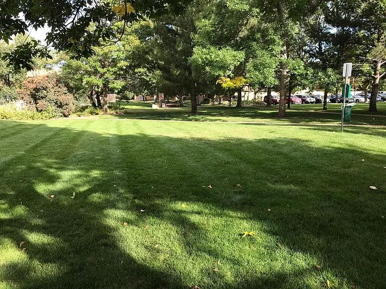Expansive HOA grounds for walking and lawn activities