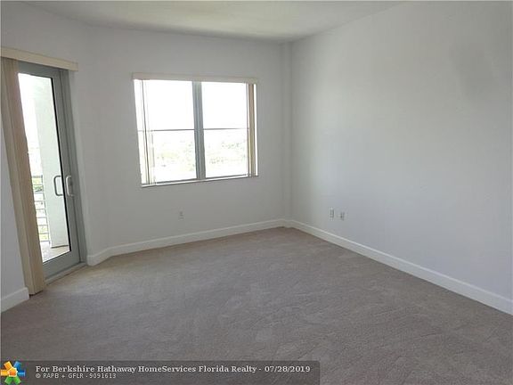 Living room. Freshly painted with brand new carpeting.