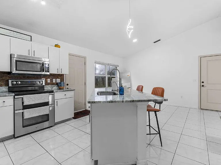645 NW 65th St — Photo 16