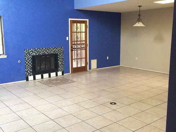 Family and dining room with cathedral ceiling