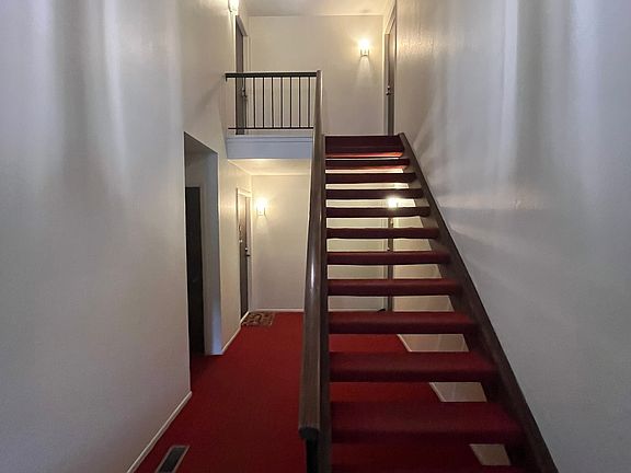 Hallway - Stairs leading up to the unit