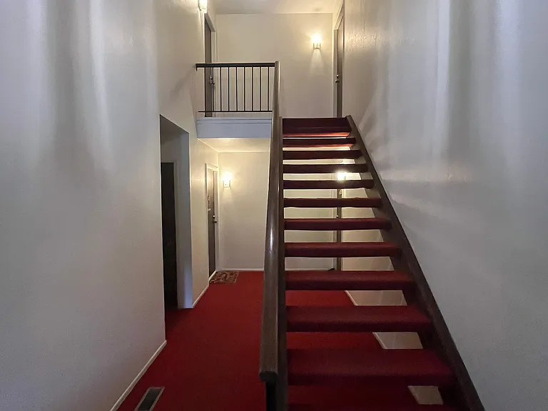 Hallway - Stairs leading up to the unit
